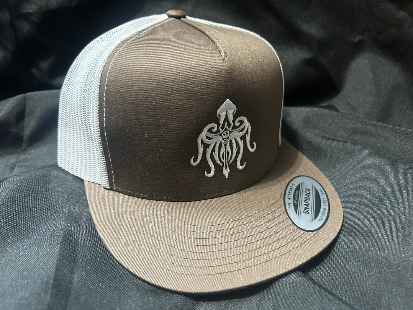 Odyssea "Mollusk" Logo Trucker Hat